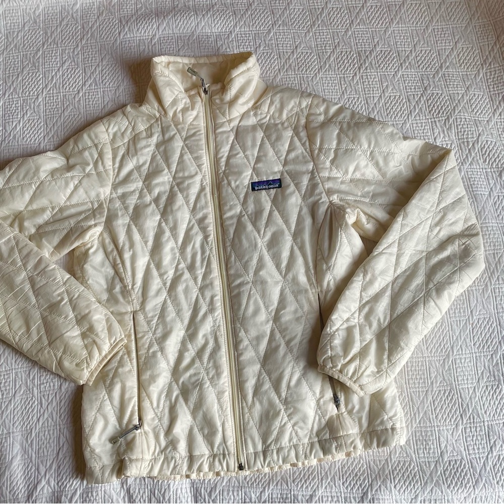 Reposhing this Patagonia real down micro puff in a cream color XS